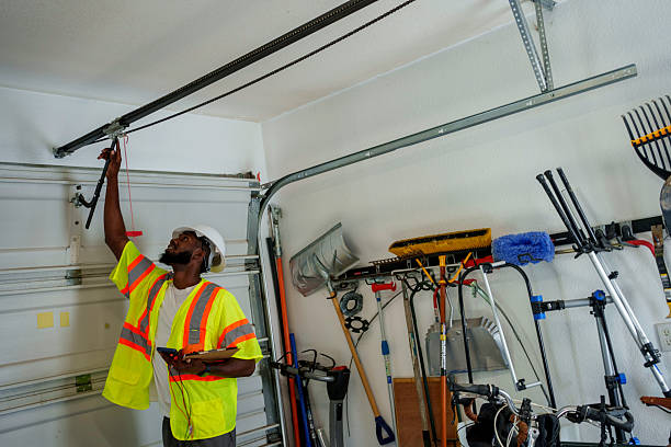Professional Garage Door Panel Replacement technician working in Yukon, OK